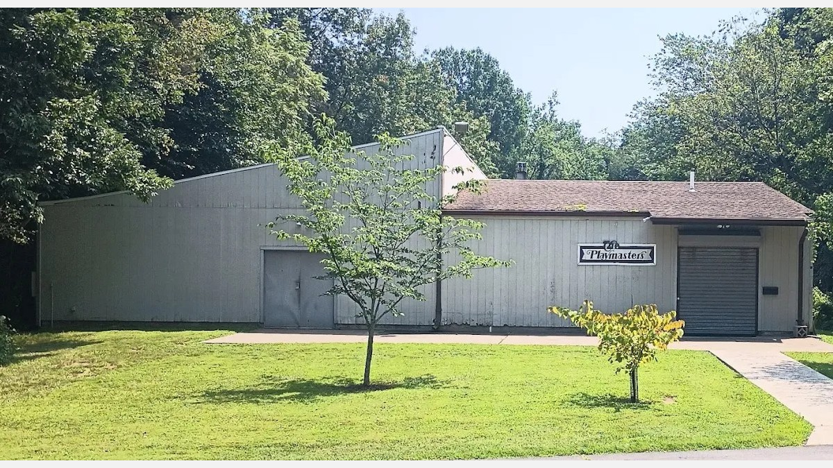 Replace theater's front siding