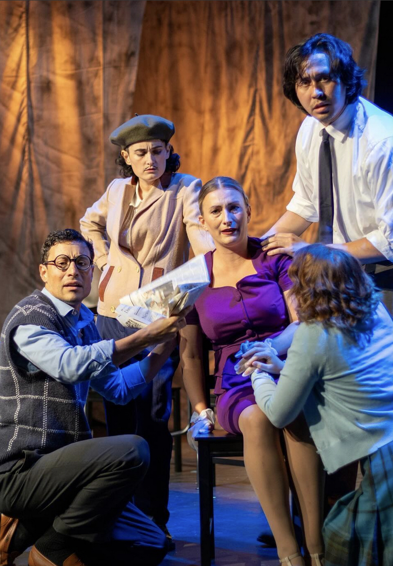 Mrs. Boeuf is surrounded by her husband's coworkers.